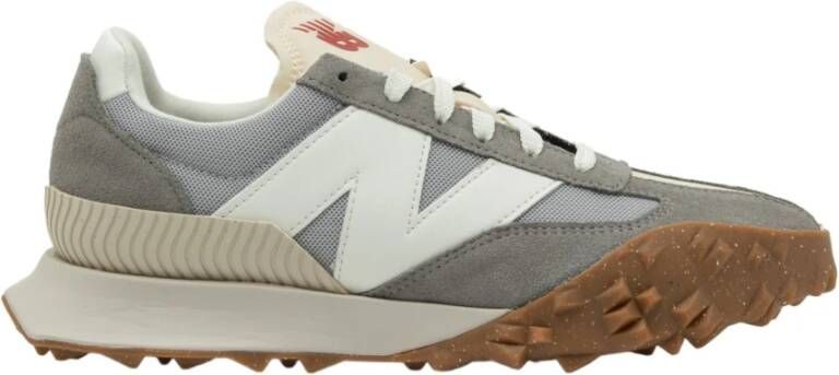 New Balance XC72 sneaker met leren en suède details